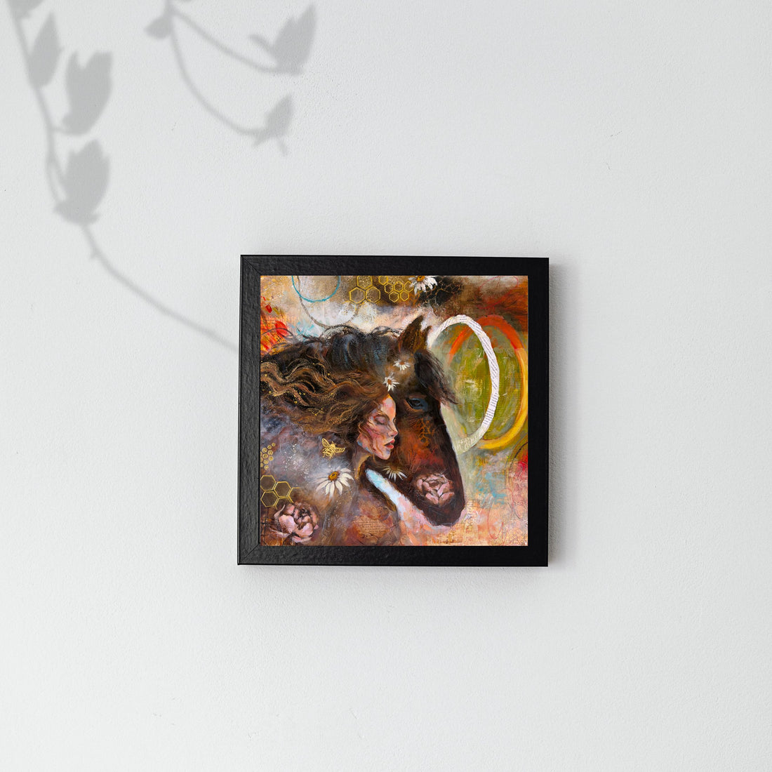 Artistic depiction of a woman with a horse's head, held by a hand against a blurred background.