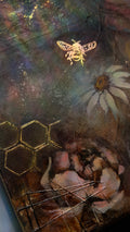 Artistic depiction of a bee and flowers with a honeycomb pattern on a dark background